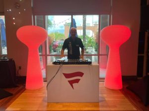 LED furniture rental setup in st pete with glowing lounge seating and bar