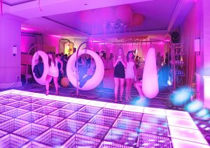 Corporate light up furniture rental with glowing LED lounge seating and tables at a Florida event